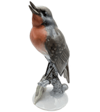 Hand-painted porcelain robin bird figurine, upright stance with orange chest and gray wings